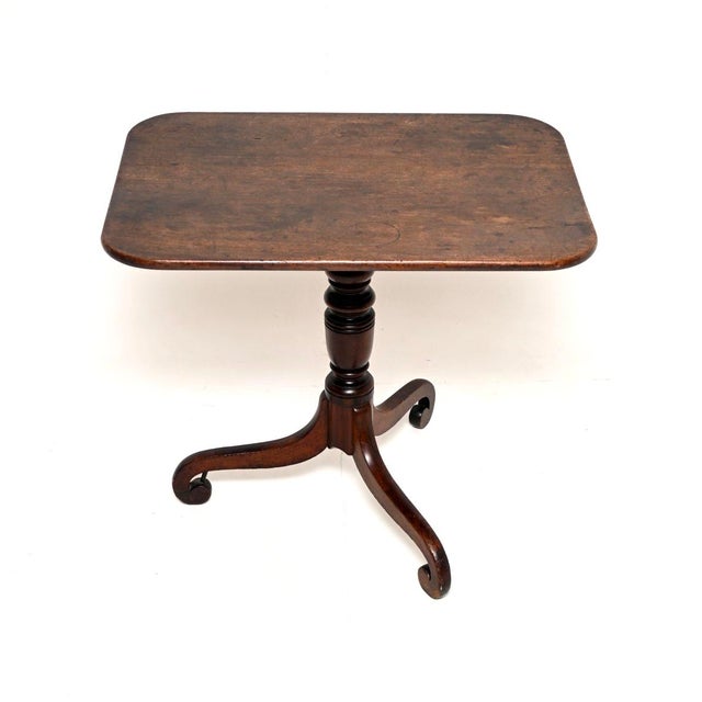 A smart and very well made antique Regency Period tilt top table. This was made in England, it dates from around the...