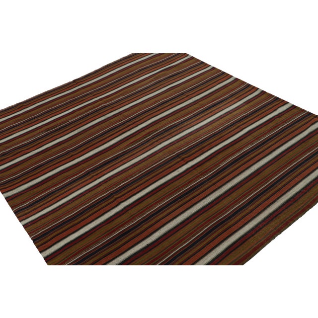 This vintage 7x6 tribal Kilim is a new addition to Rug & Kilim’s mid-century curations. Handwoven in wool, it originates...