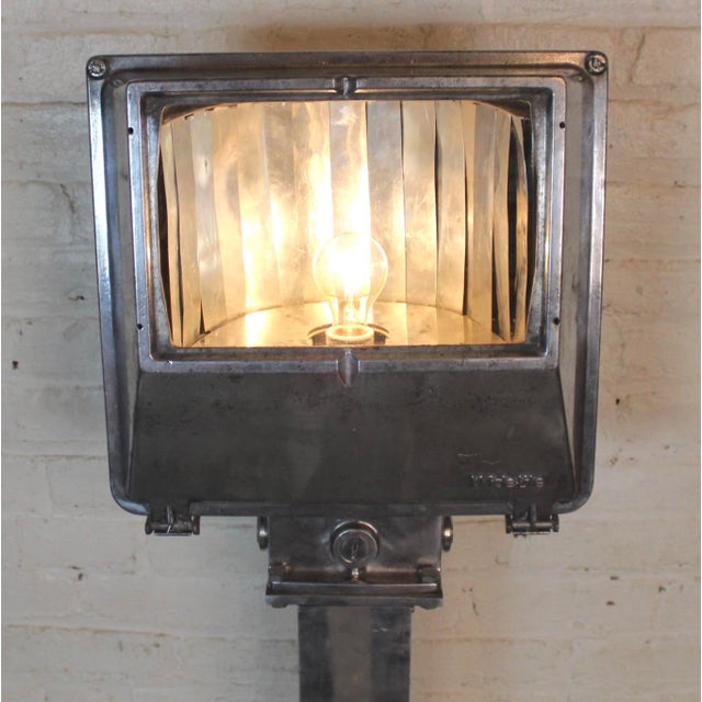 Five foot tall industrial flood lamp for your modern home or office. Features polished aluminum frame and single bulb with...