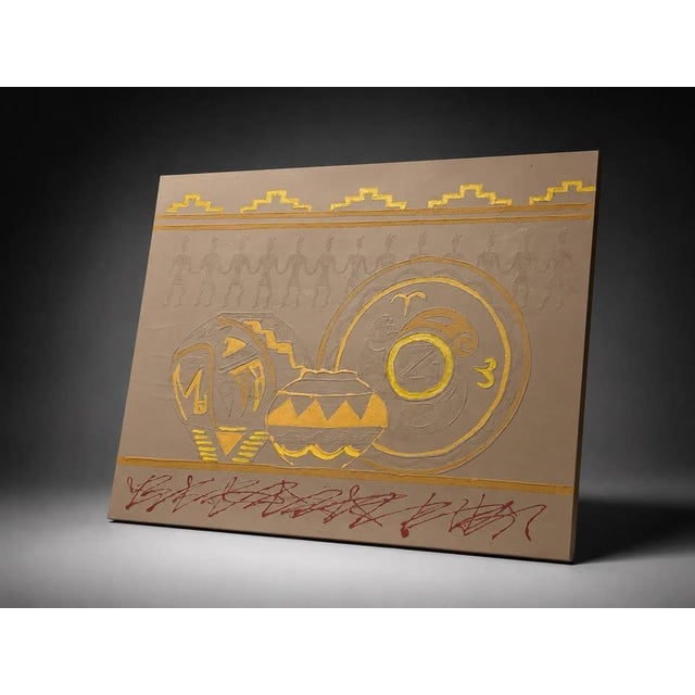 Large Southwestern style textured canvas wall art featuring a tan background with yellow, gold, taupe, and red accents....