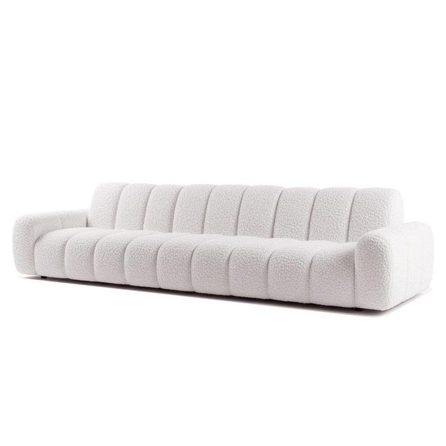 Modular Sofa in White Sheep-Textured Fabric. Quiet confidence. Steady courage. Upholstered in white sheep-textured fabric,...