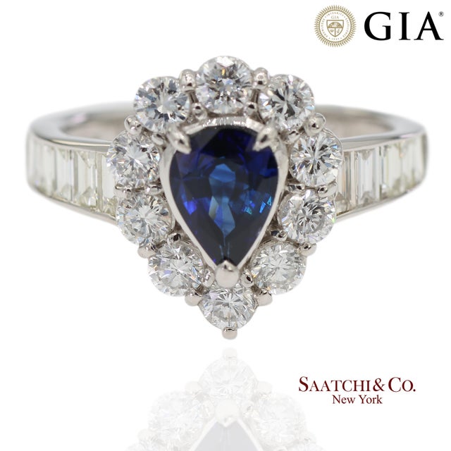 GIA Certified Platinum 900 Blue Sapphire and Natural Diamond Ring Metal Type: 900 Platinum Total Item Weight: 5.5 Grams...