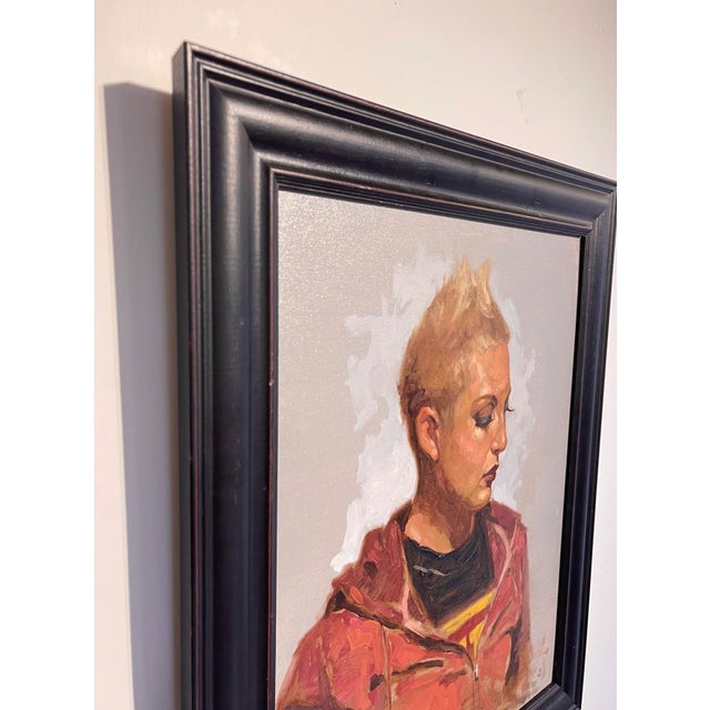 Contemporary Untitled by Brian Busch | Oil on panel Portrait of a woman with short hair in a hoodie. For Sale - Image 3 of 3