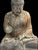 Large carved woof figure depicting the Medicine Buddha seated in meditation upon a double lotus throne. Retains extensive...