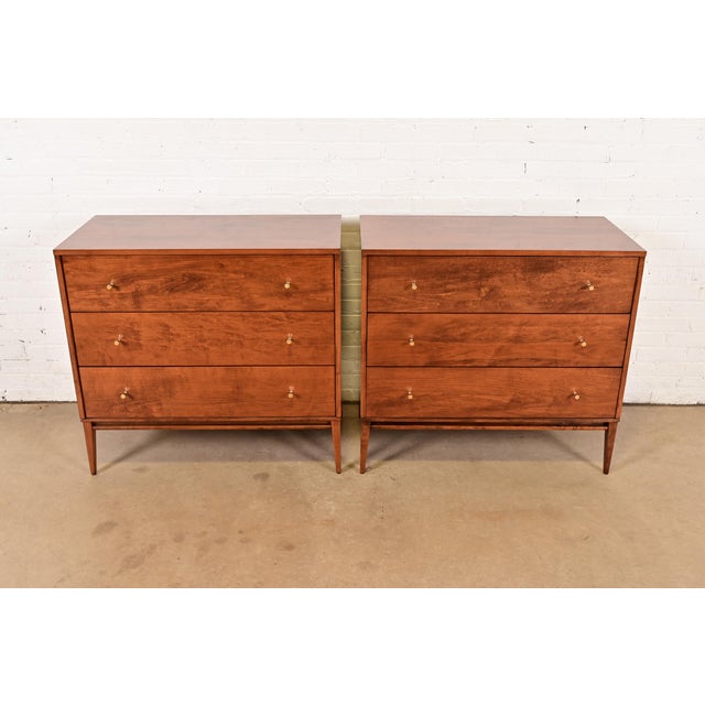 A sleek and stylish pair of Mid-Century Modern three-drawer dressers or chests of drawers By Paul McCobb for Winchendon...