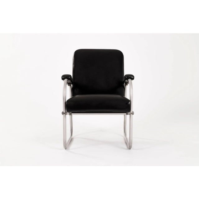 Aluminum and leather lounges by Warren McArthur for Namco. Restored with spinney back leather.