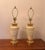 Elevate your space with this gorgeous, matched pair of vintage 1970s/1980s Hollywood Regency urn-form table lamps....