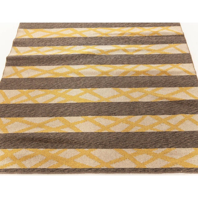 Vintage Swedish Flat-Weave Rug, Double-Sided Geometric Design Size: 4'2" × 5'8" (127 × 172 cm). A striking example of...