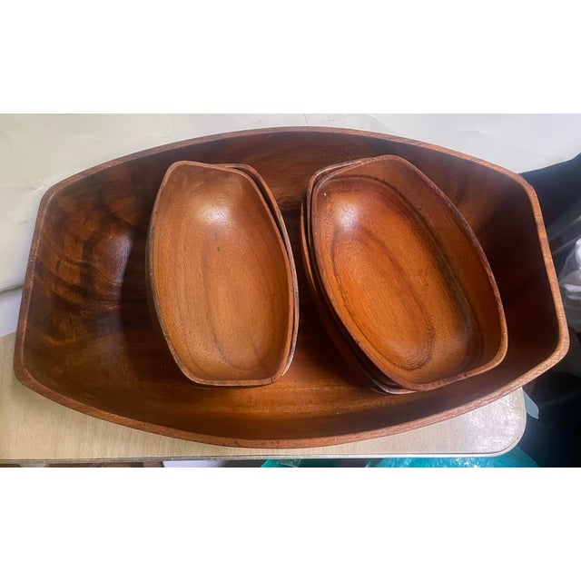 This is a wonderful large attractive salad set consisting of a large bowl, 15 1/2 inches wide and three individual bowls...