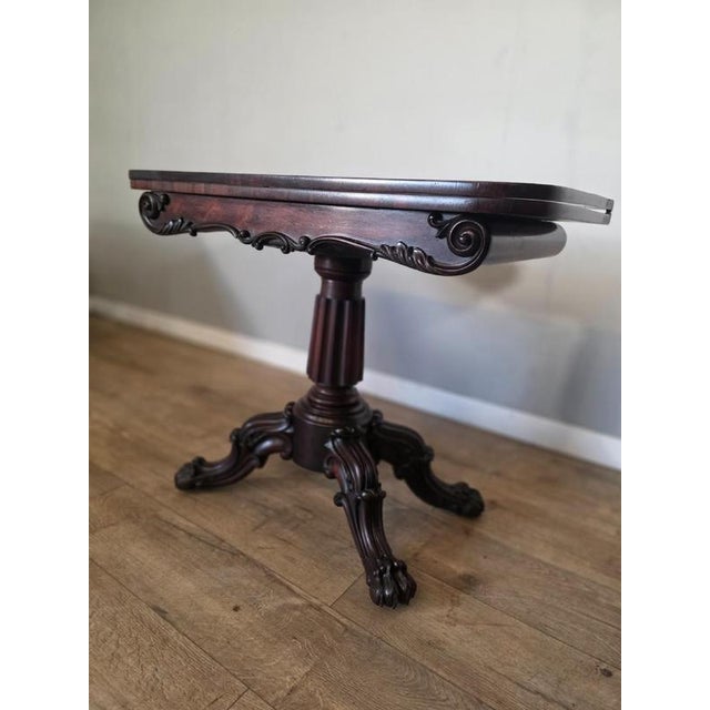 This piece of furniture exudes elegance and charm. Made from luxurious rosewood, this tea table is not only functional but...
