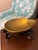 A beautifully minimal vintage brass ashtray or trinket dish marked “Made in Austria,” featuring a softly sculpted organic...