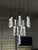 Each glass droplet is individually handcrafted, creating a stunning texture that catches and beautifully diffuses the...