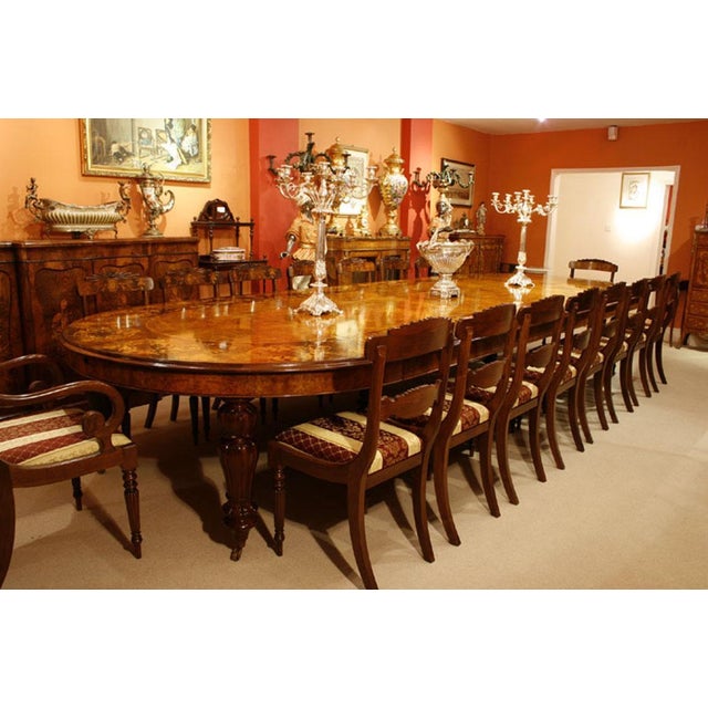 This is a fantastic vintage Victorian style marquetry dining set, comprising a gorgeous burr walnut and marquetry dining...