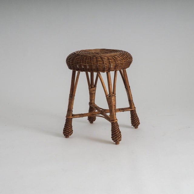 Bring a touch of organic warmth and vintage charm to your home with this beautifully crafted woven wicker stool. Ideal...