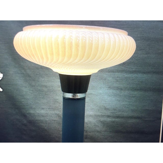 This handsome Mid Century Modern Lucite torchiere dove gray color floor lamp features alternating small bands of chrome...