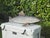A substantial hand-carved folk art fish sculpture with hand-forged steel fins and a weathered painted finish. Visible...
