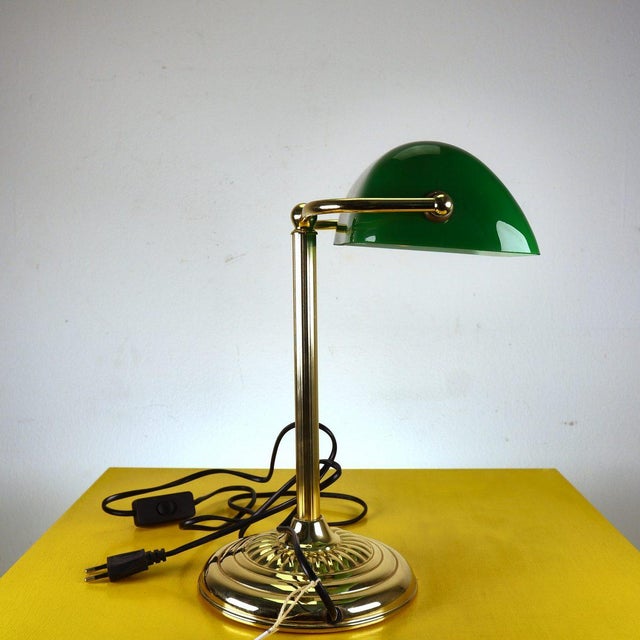 ministerial style table lamp Height: 35 Width: 26 Depth: 23 Diameter: 18 This piece is attributed to the mentioned...