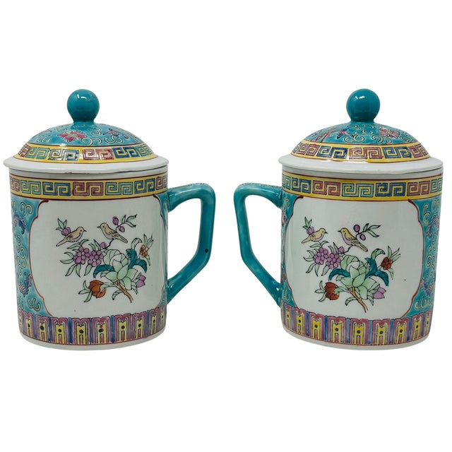 This is a beautiful and collectible pair of vintage Chinese porcelain mugs with matching lids. Each mug is hand-painted in...