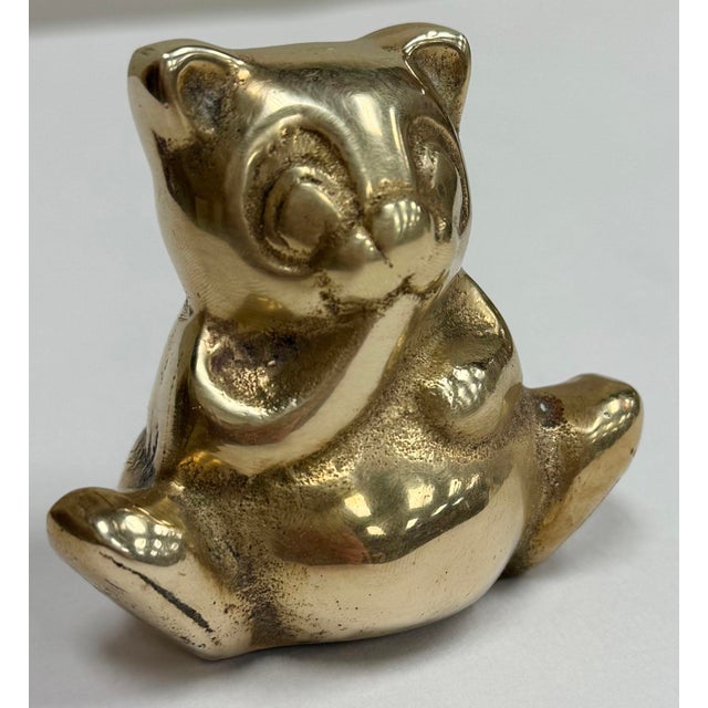 Charming and whimsical seated brass panda bear figure. This would make an adorable decorative accessory, bookend or paper...