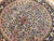 "A rare and exquisite round-shaped vintage Persian Tabriz rug from the early 20th century — an exceptional format that was...