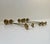 A set of 7 matching pendant/counterweight candleholders in solid brass. Made in Sweden or Denmark during the 1960s. They...