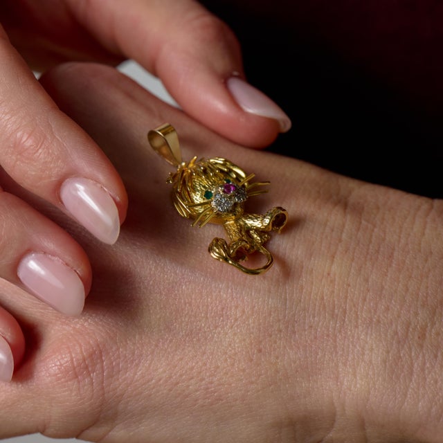 This captivating Mid Century lion pendant is a powerful symbol of strength, courage, and timeless elegance, rendered in...