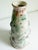 Vintage studio pottery ceramic vase with embedded steel wire accents, circa 1990s. The wire has been woven around the vase...