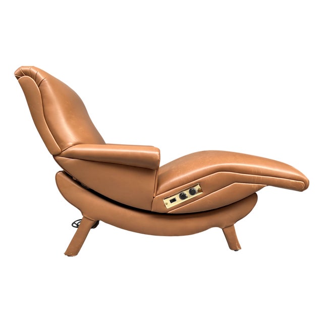An iconic Contour Chair Lounge Co. electric recliner, representing one of the most recognizable lounge chair designs of...
