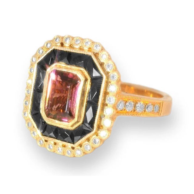 Elegant Art Deco estate ring crafted in 14K pink rose gold, featuring a natural emerald-cut pink tourmaline centerpiece 1...
