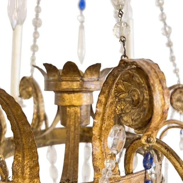A wonderful pair of highly decorative chandeliers. Please take a look at all our pictures to see the beading work -...