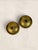 A charming pair of English Victorian brass chambersticks, dating to circa 1890. Crafted from solid brass, each features a...
