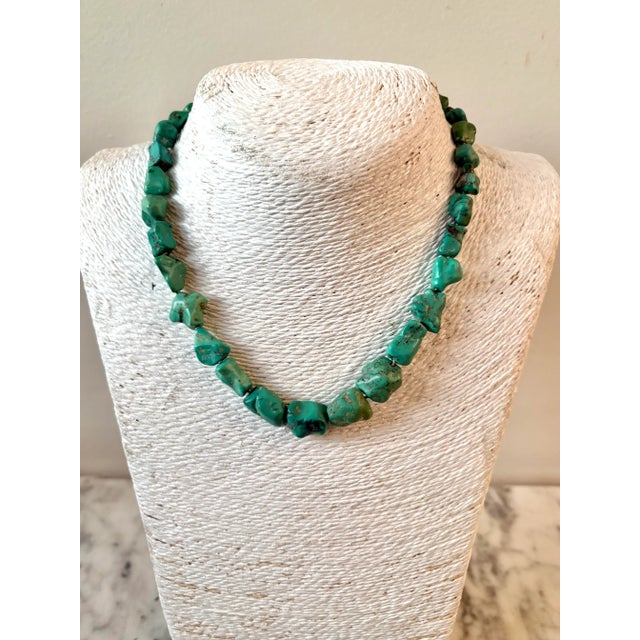 Lovely turquoise beaded necklace with fishhook clasp. Perfect to add a pop of color to any outfit or pair with coastal...