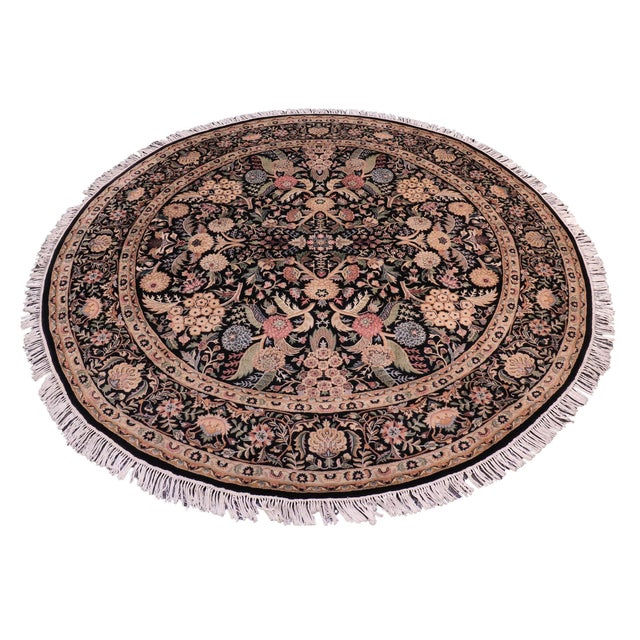 This hand‑knotted Pak Persian round rug showcases the finest expression of traditional Persian artistry. Each piece is...
