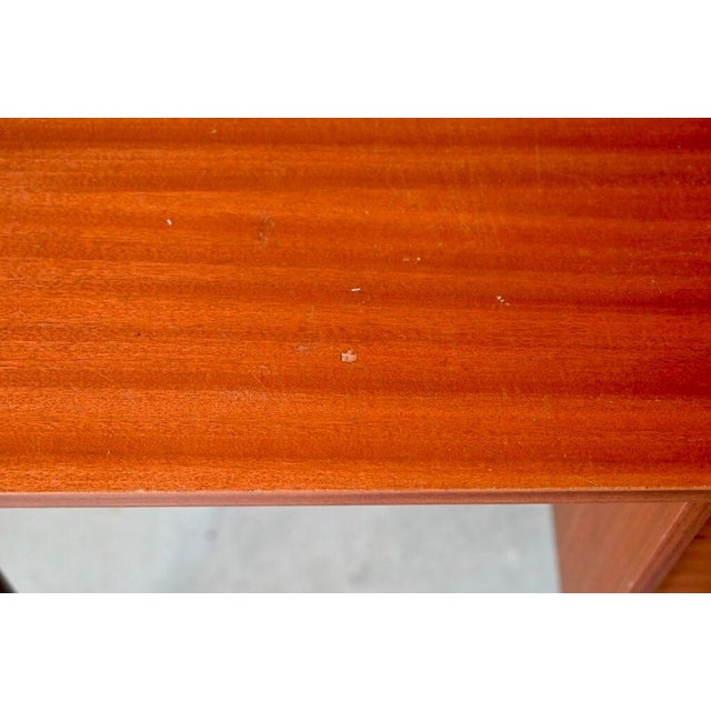 This compact Scandinavian desk combines presence and quality craftsmanship. Its serious appearance is softened by careful...