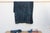A masterwork of Malian textile heritage featuring deep indigo saturation and symbolic geometric motifs. Originating from...