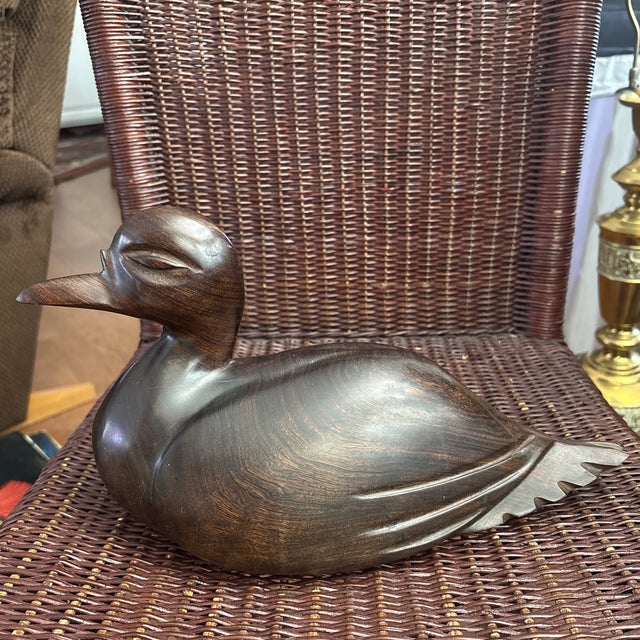 MCM hand-carved ironwood duck figurine, similar to those crafted by artisans in the Southwestern United States. The dense,...