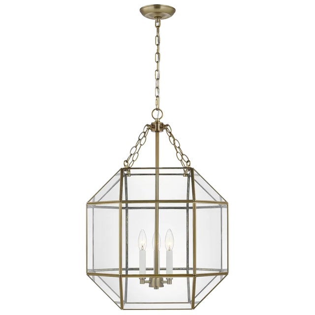 The Morrison three light indoor pendant in satin brass enhances the beauty of your home with ample light and style to...