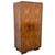 A two-door Art Deco wardrobe dating from the 1930s, characterised by its softly rounded corners, balanced proportions and...