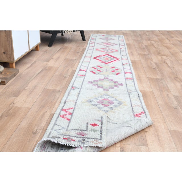 Vintage Turkish Oushak White Runner with Colorful Motifs For Sale - Image 4 of 11