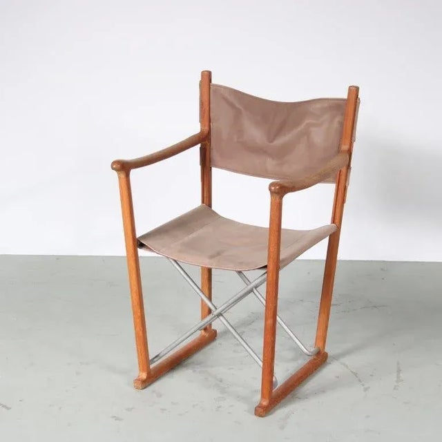 A beautiful safari style folding chair, designed by Peter Karpf and manufactured by Tripp Trapp Skagerak in Denmark around...