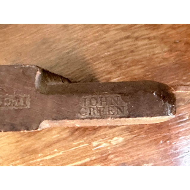 A handsome 19th-century English molding plane handcrafted from solid beech and retaining its original wooden wedge. This...