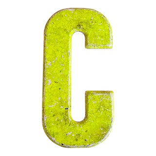1950s Enameled Metal Letter “C” With Yellow Patina For Sale