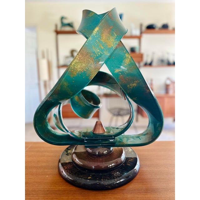 Contemporary modern sculpture by renowned artist, Shlomi Haziza, known for his dynamic Lucite creations. This piece...