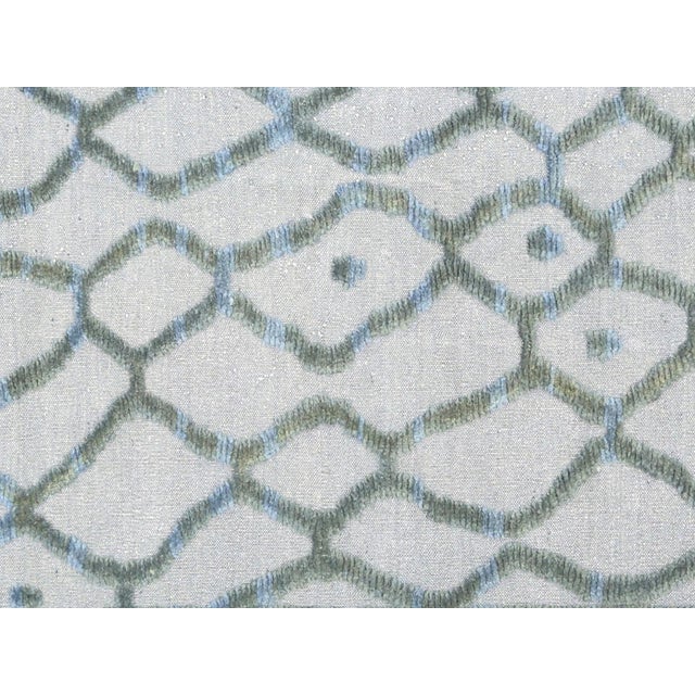 This Vintage Turkish Tulu Rug features a contemporary design and is hand woven in the Oushak region of Western Turkey. The...