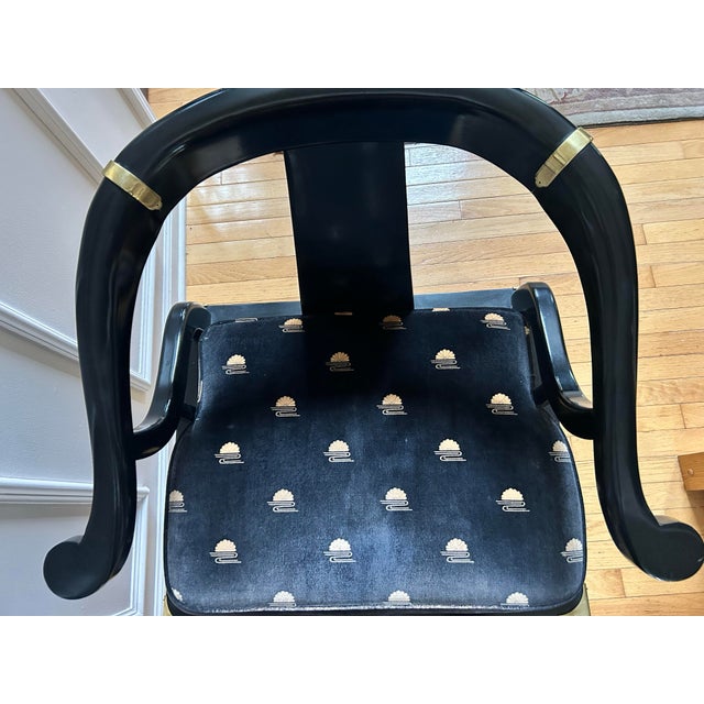 Opulent Chinese Ming-style horseshoe lounge chairs made by Century Furniture. Originally designed by James Mont, these...