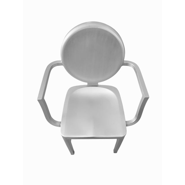 There is no documentation or manufacturers stamp on the 8 chairs but they are certainly in the style of the Emeco Kong...