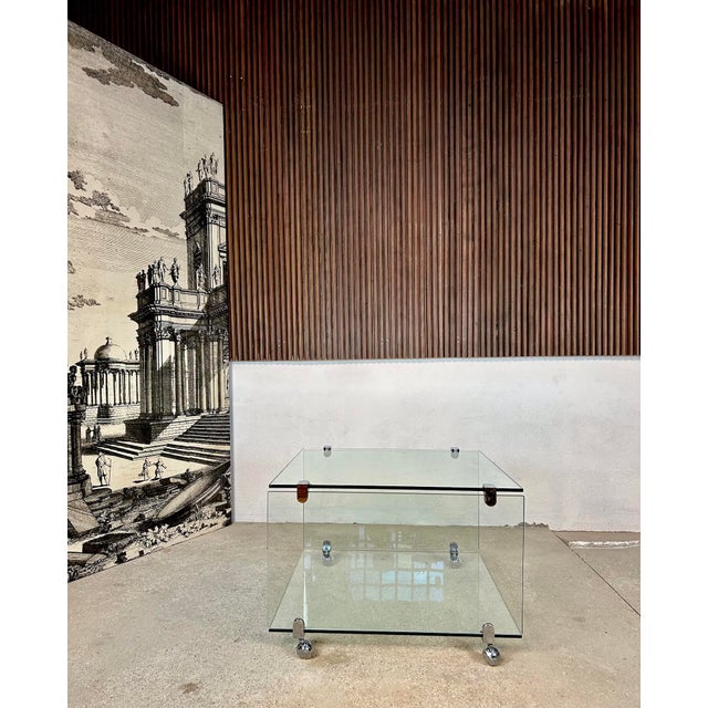 This high quality minimalist design glass side table was manufactured by Draenert in West Germany during the 1960s. Eight...