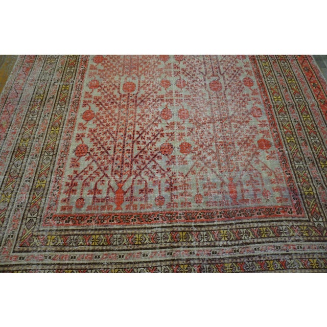 Antique Central Asian Khotan Rug With Unusual Floral Motif Pattern on a Pale Gray Background For Sale - Image 4 of 12