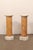 An Italian pair of faux-marbled column pedestals from the mid 20th century. These vintage pedestals from Italy each...
