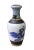 This is a Chinese decorative porcelain vase made of different combination of technique. There are crackle pattern, relief...